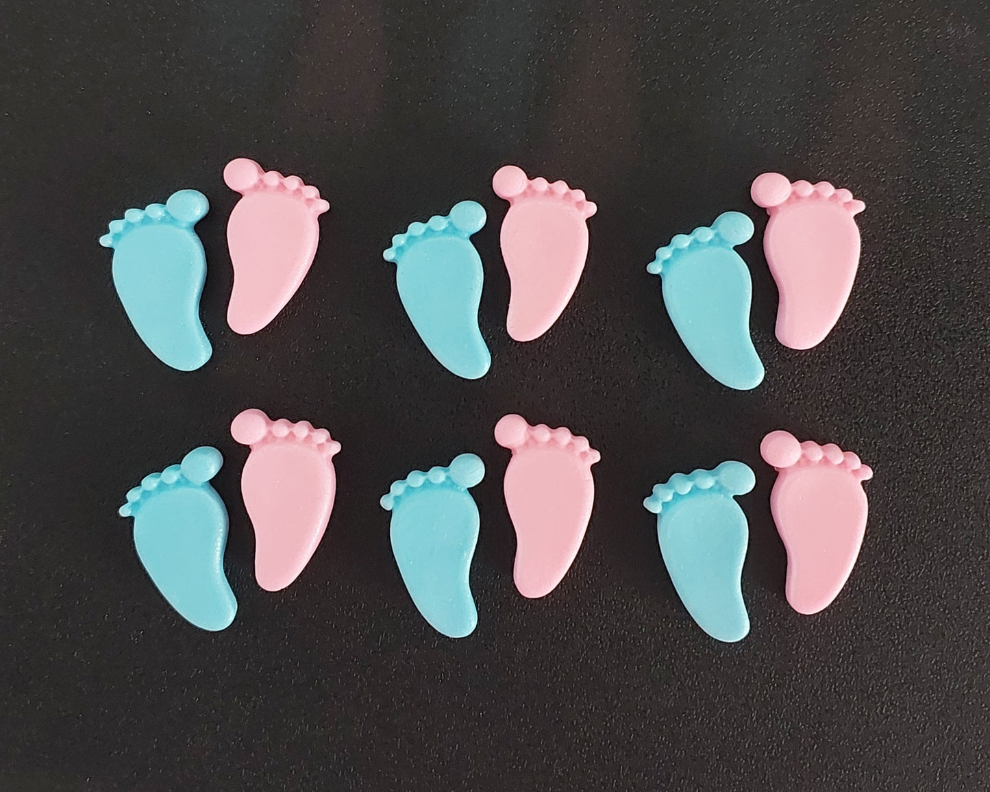 Pink and blue baby feet, edible fondant icing decorations by Cake Candy NZ