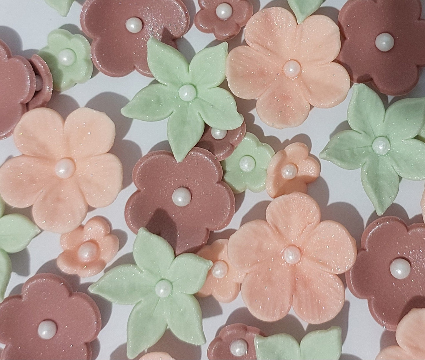 close up of edible sugar flowers in earthy tones by Cake Candy NZ