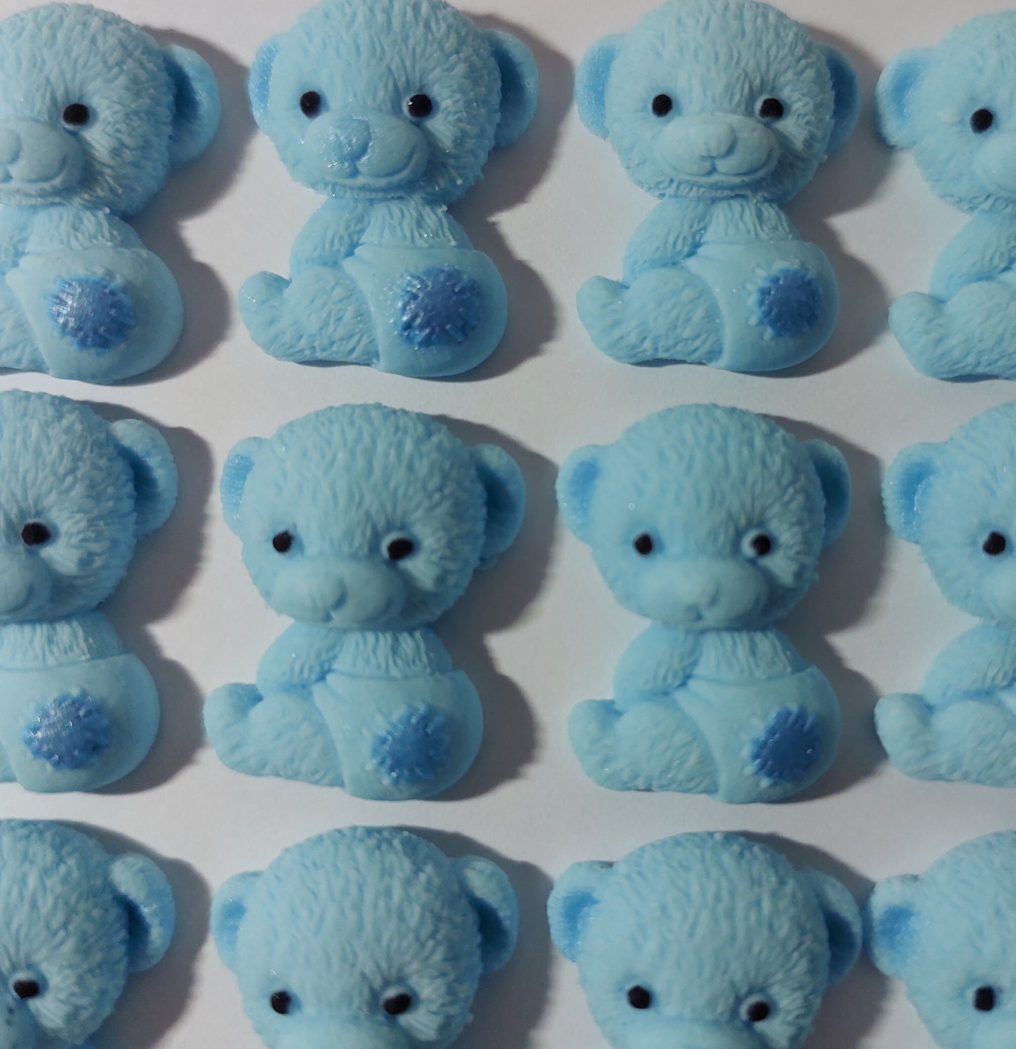 adorable small blue teddy bear babies with nappy on. Edible fondant icing decorations by Cake Candy NZ