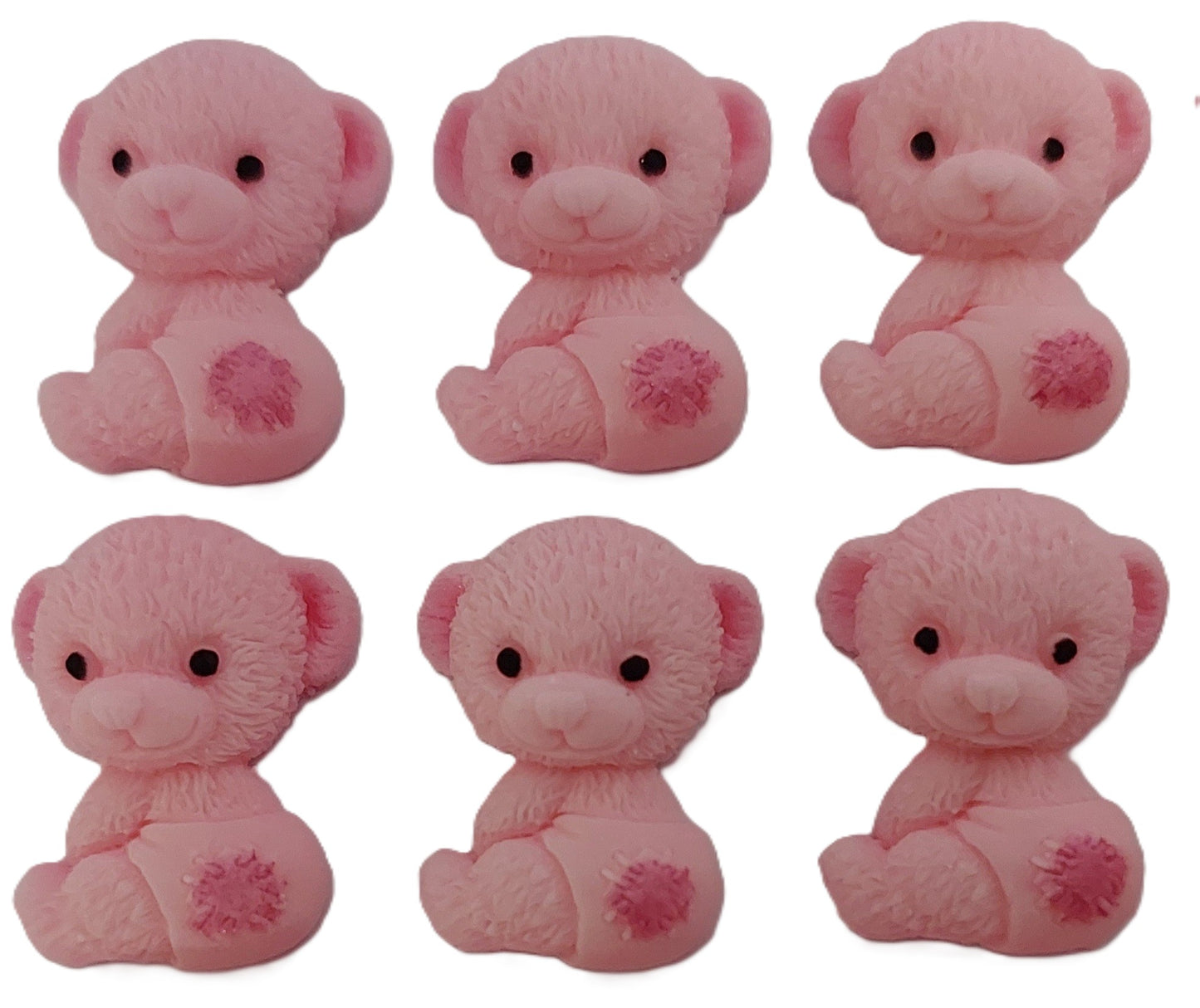 Small pink baby teddy bears with nappy on. Edible fondant decorations by Cake Candy NZ