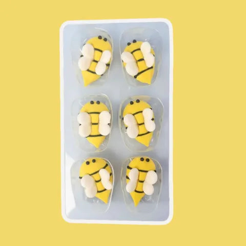 six bees, royal icing cake decorations