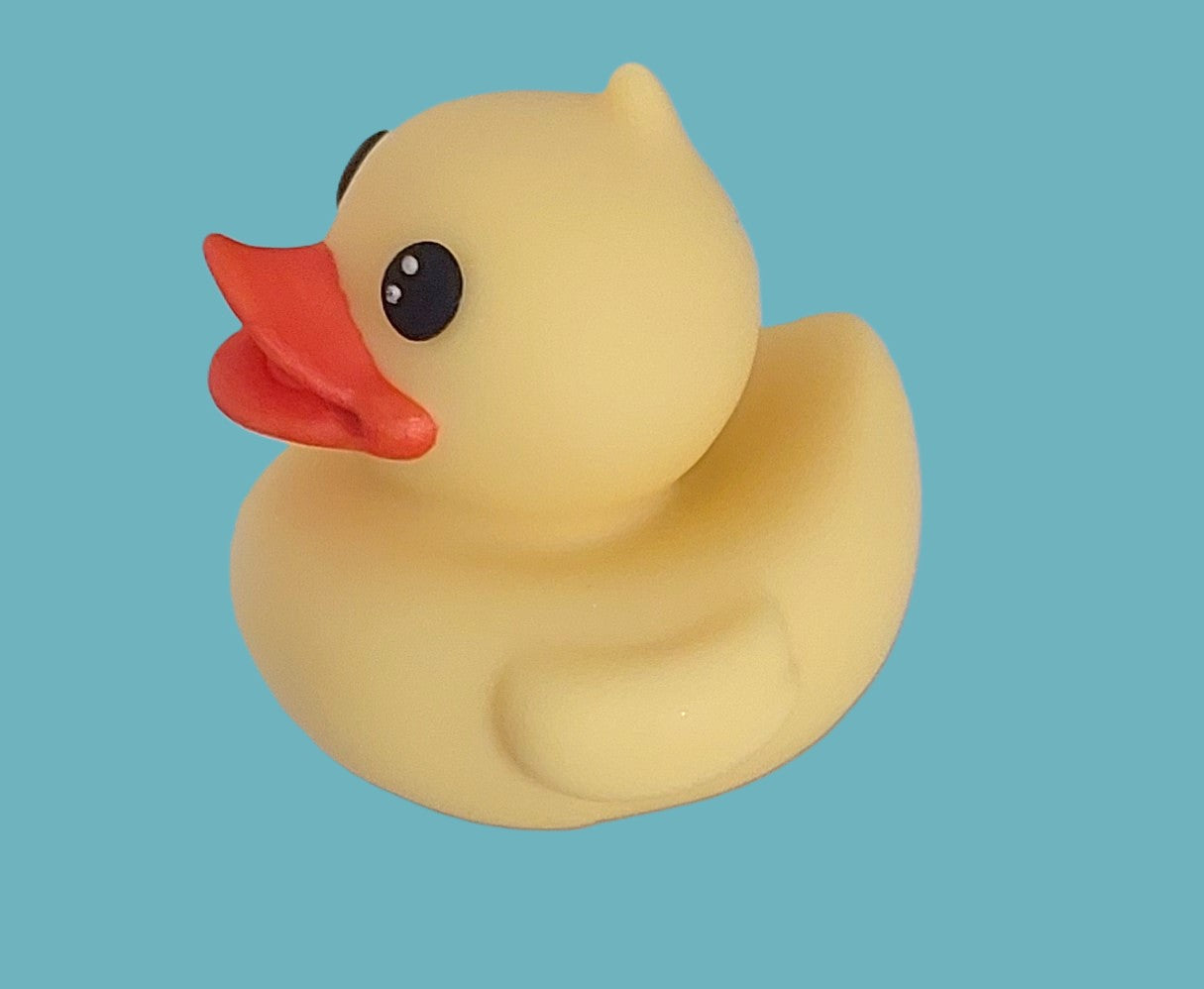 A yellow duck, edible chocolate decoration by Cake Candy NZ.