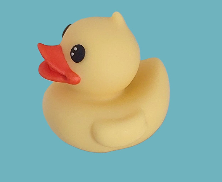 A yellow duck, edible chocolate decoration by Cake Candy NZ.