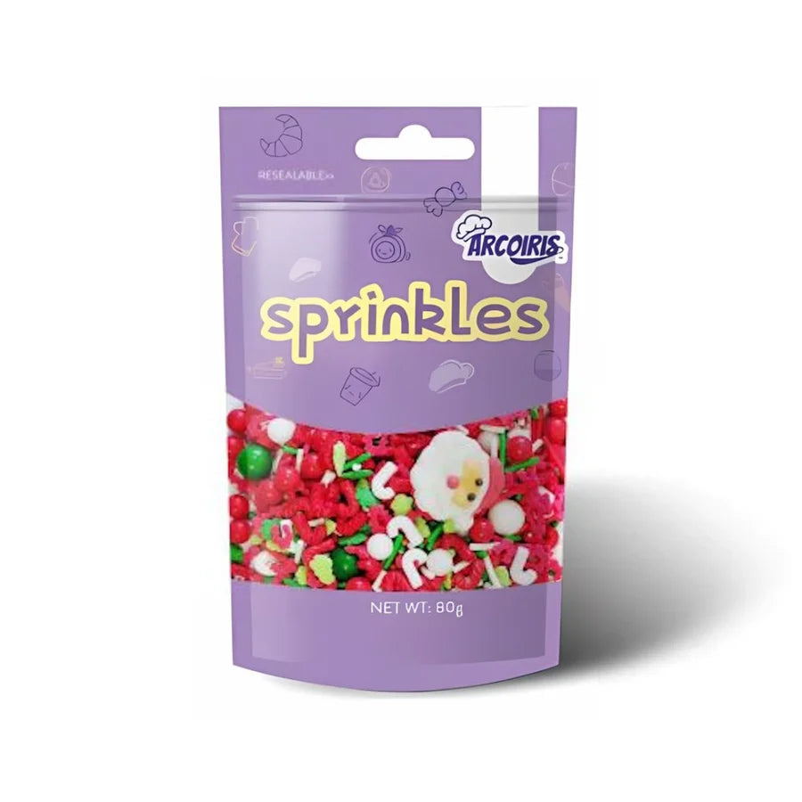 packet showing Santa faces, snowmen and trees. Arcoiris edible cake sprinkles