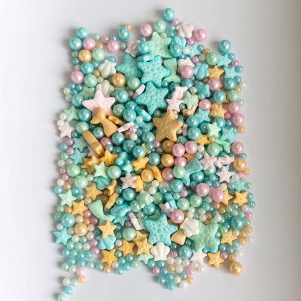 colorful sealife shaped sprinkles on a white background