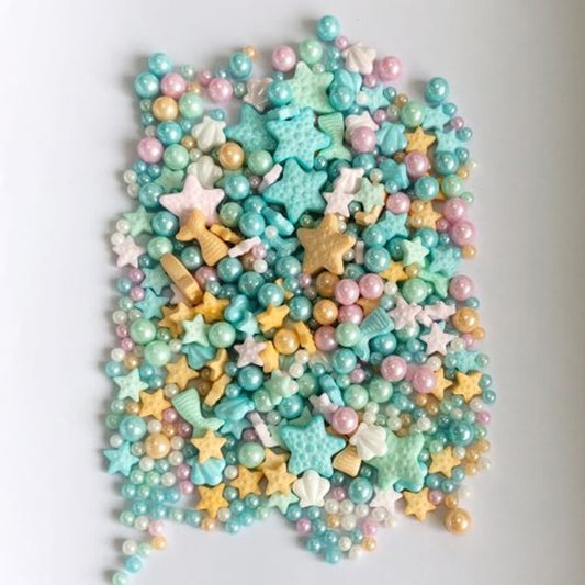 colorful sealife shaped sprinkles on a white background