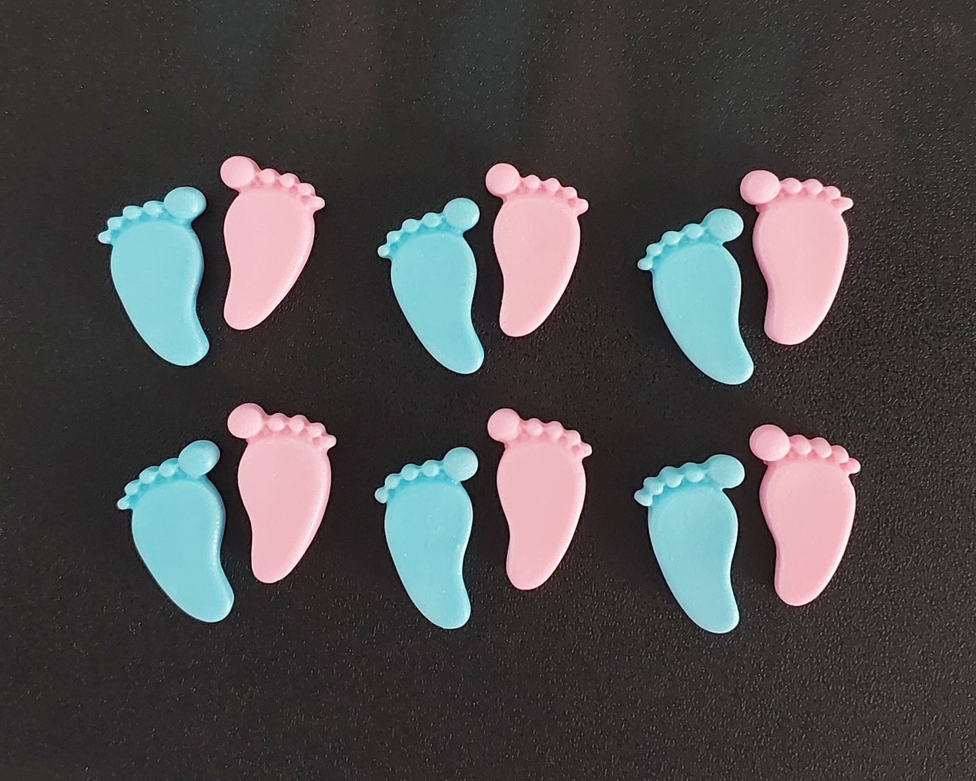 Pink and blue baby feet, edible fondant icing decorations by Cake Candy NZ
