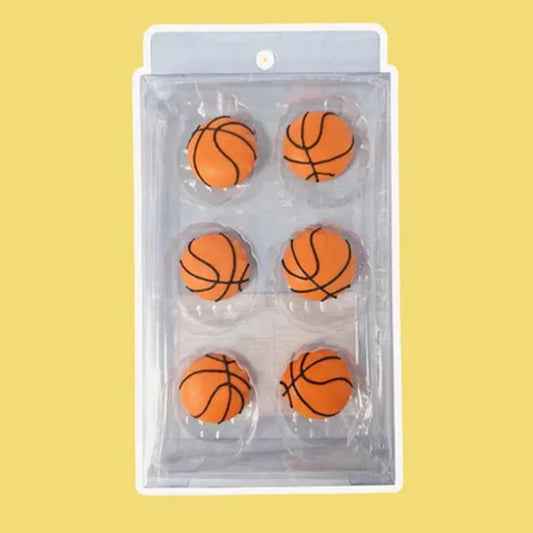 six pieces of royal icing orange baseball cake decorations.