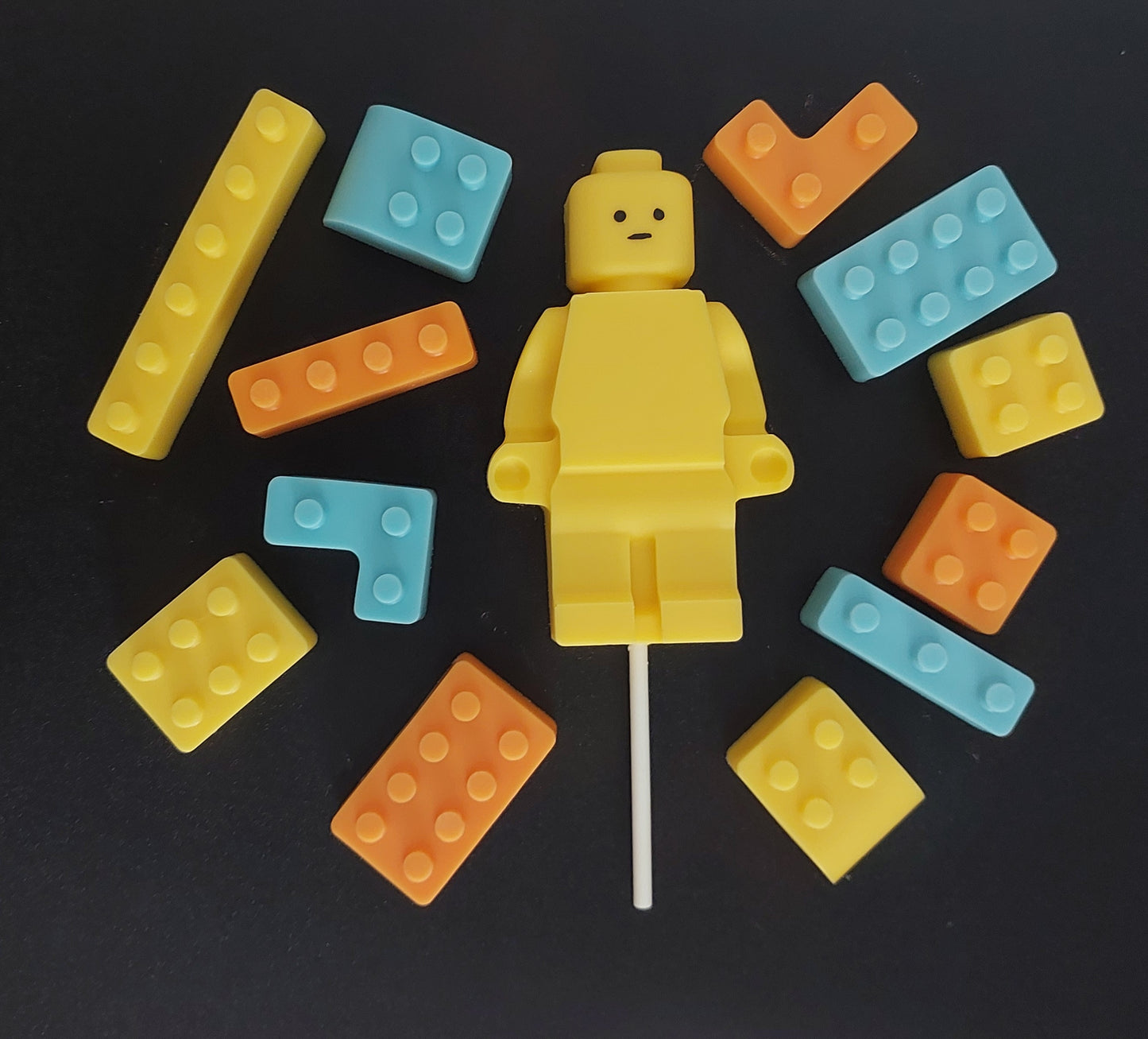 Yellow lego-shaped  topper with colorful brick pieces edible decoration by Cake Candy NZ