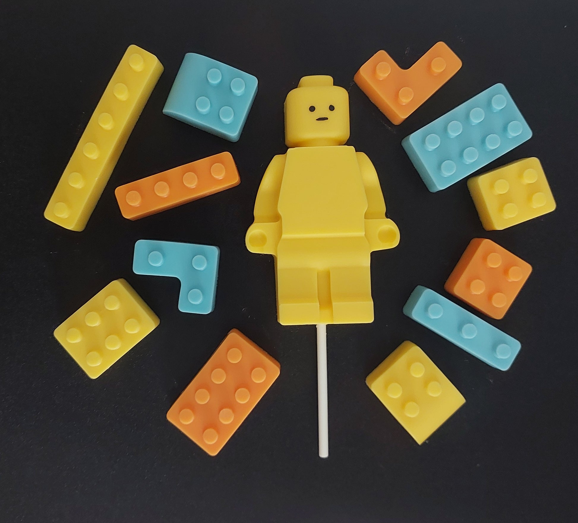 Yellow lego-shaped  topper with colorful brick pieces edible decoration by Cake Candy NZ