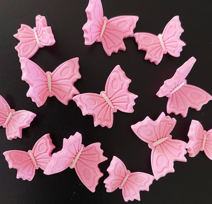 A set of sparkling pink butterflies in 2 sizes, edible fondant icing cake decorations