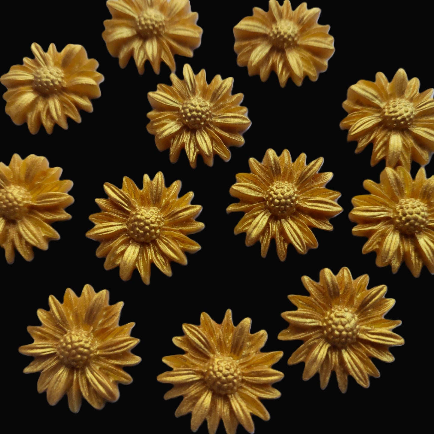 Twelve gold daisies, edible fondant icing decorations by Cake Candy NZ