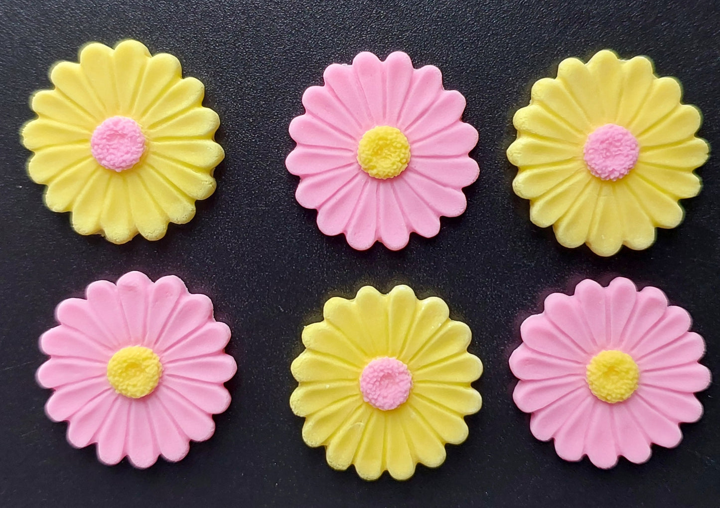 Yellow and pink daisies, edible fondant icing decorations by Cake Candy NZ
