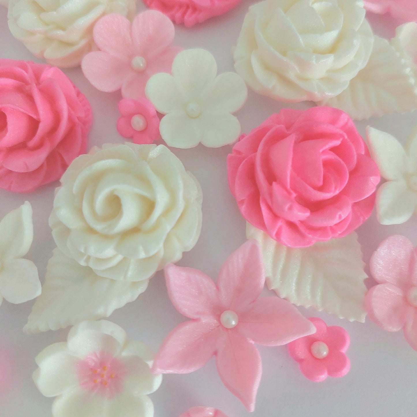 Pink and white flowers, edible fondant icing decorations by Cake Candy NZ