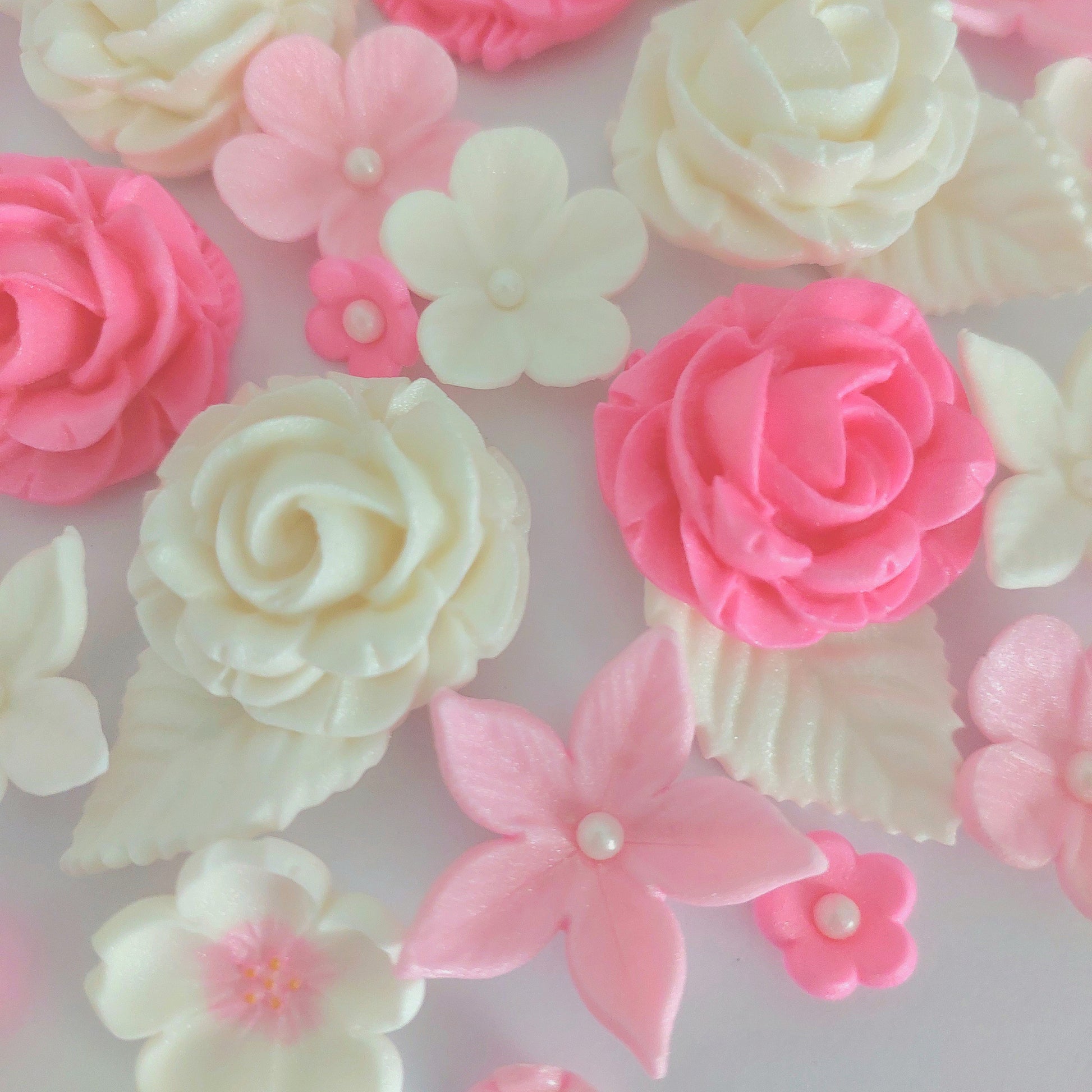 Pink and white flowers, edible fondant icing decorations by Cake Candy NZ