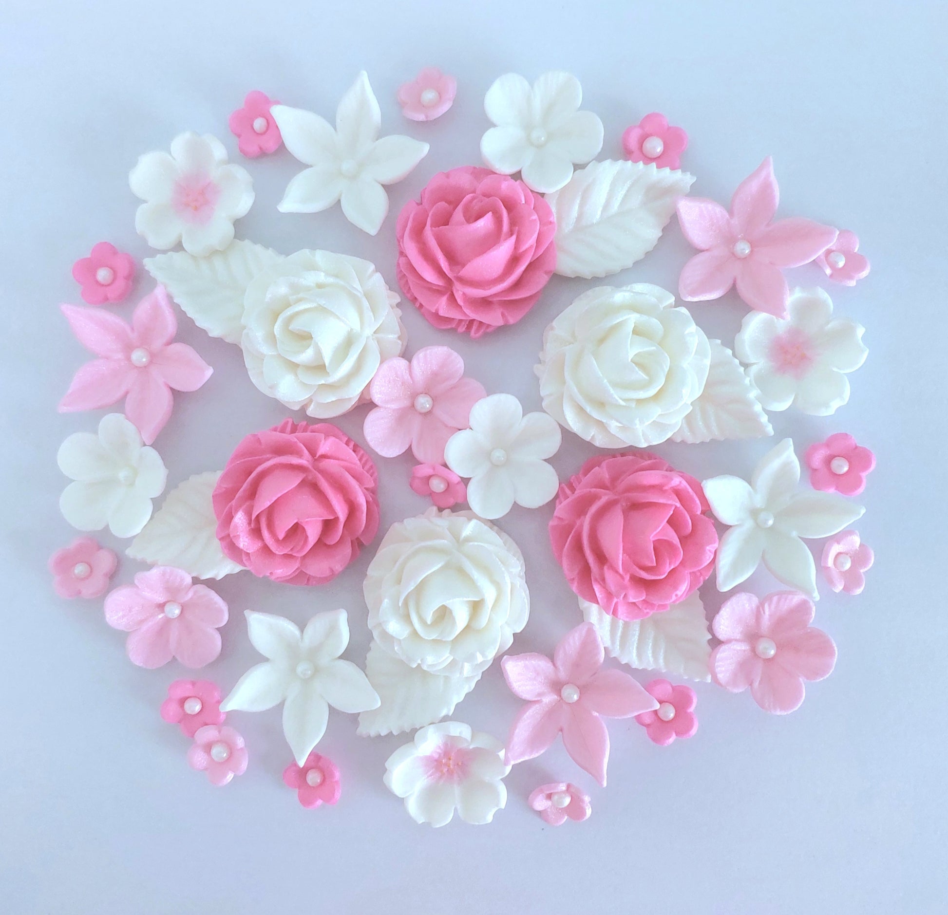 Pink and white flowers, edible fondant icing decorations by Cake Candy NZ