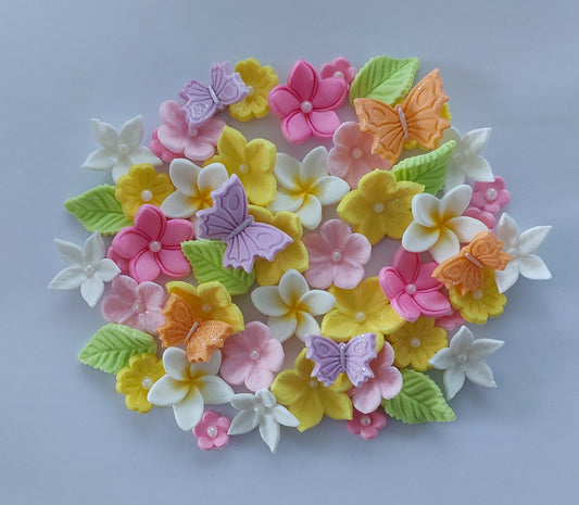 Colourful assortment of flowers and butterflies, edible fondant icing decorations by Cake Candy NZ