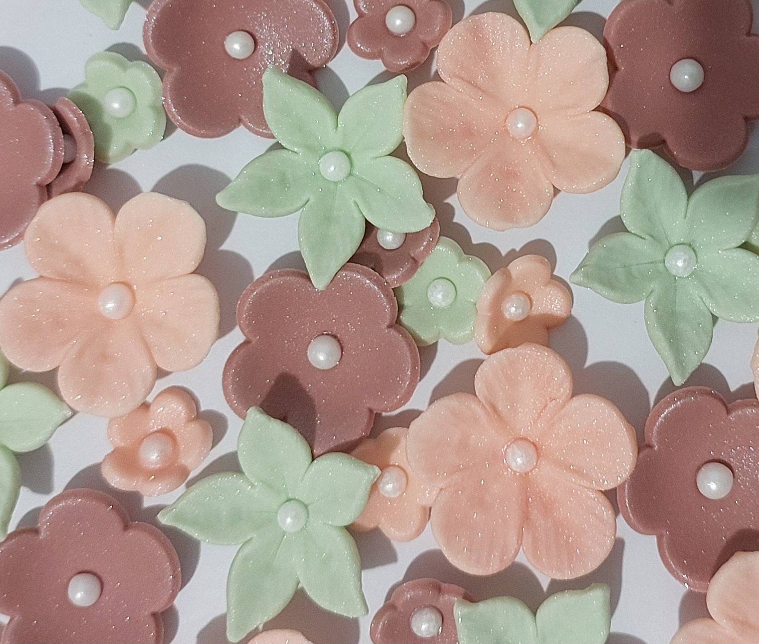 close up of edible sugar flowers in earthy tones by Cake Candy NZ
