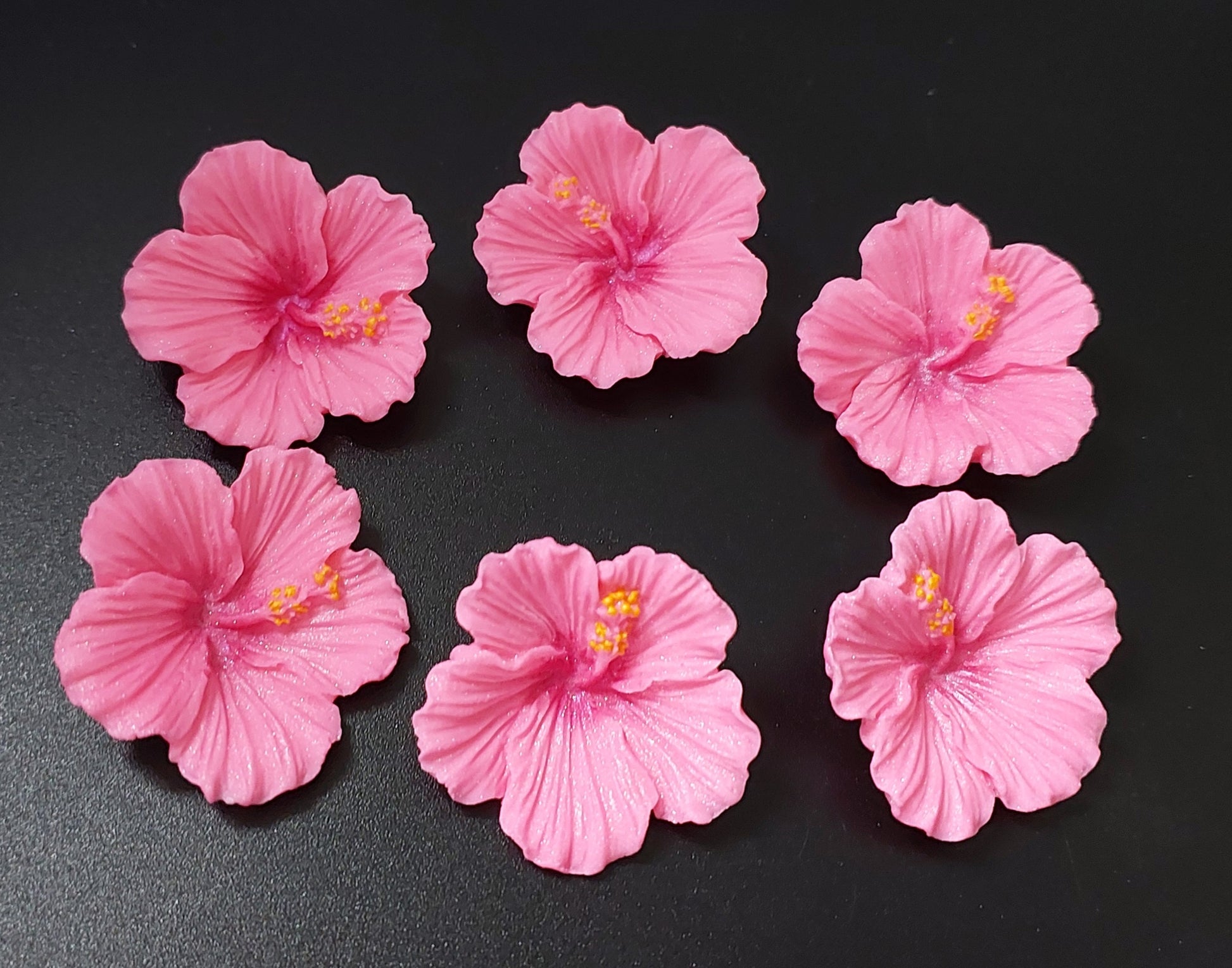 Six pink hibiscus flowers, edible fondant icing decorations by Cake Candy NZ