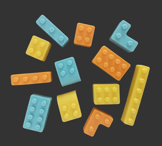 colourful building blocks, edible chocolate cake decorations.