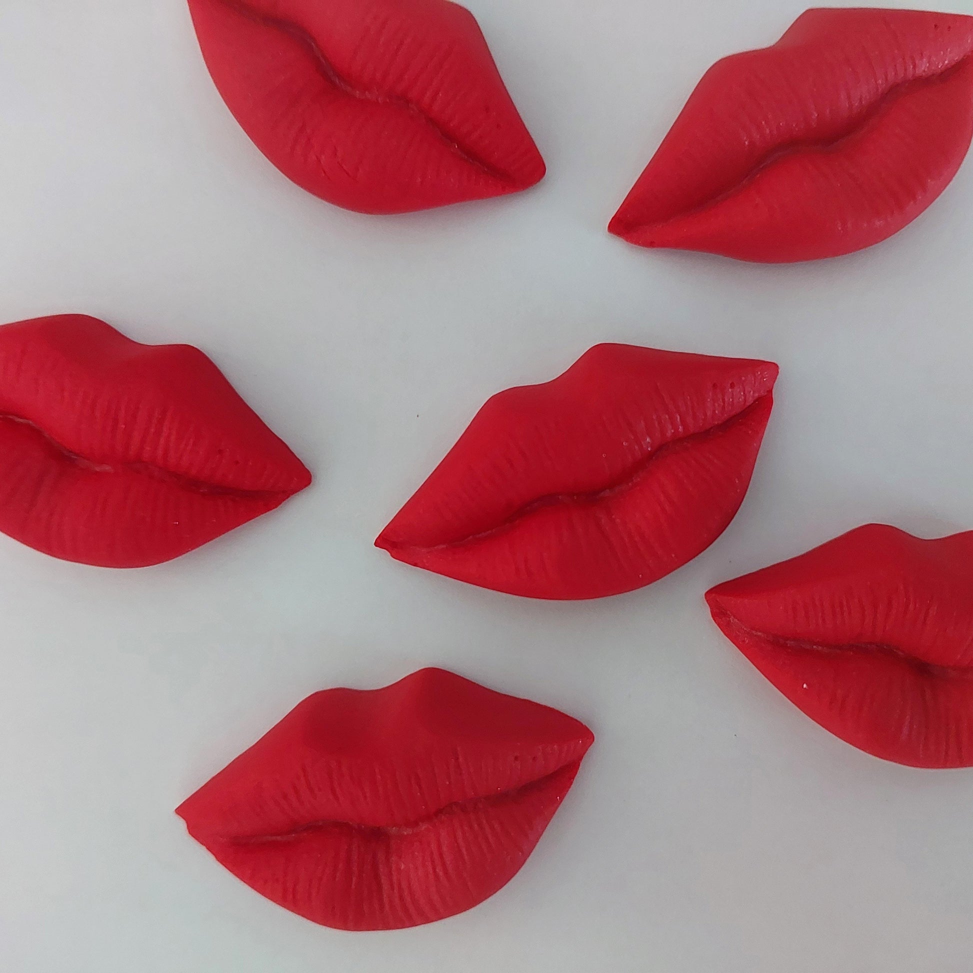 Large red lips, edible fondant icing decorations by Cake Candy NZ