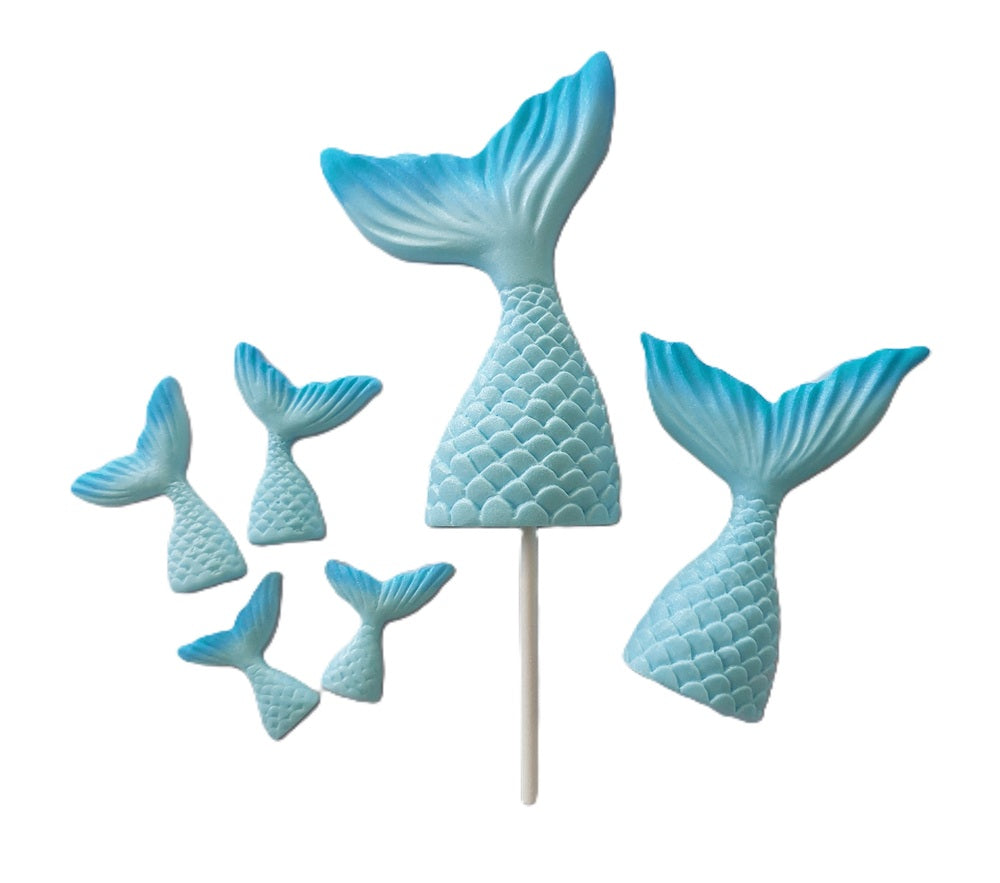 Set of six blue mermaid tails in different sizes. Edible fondant decorations by Cake Candy NZ.