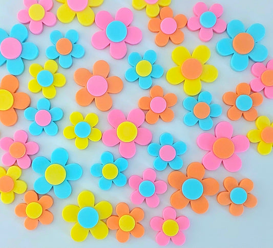 Thirty six colourful blossoms, yellow, orange, pink and blue. Edible fondant icing decorations by Cake Candy NZ