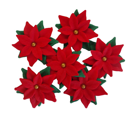 Red poinsettia flowers, edible fondant icing Christmas decorations by Cake Candy NZ