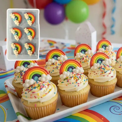 Cupcakes decorated with rainbow and cloud designs on a colorful background with balloons.