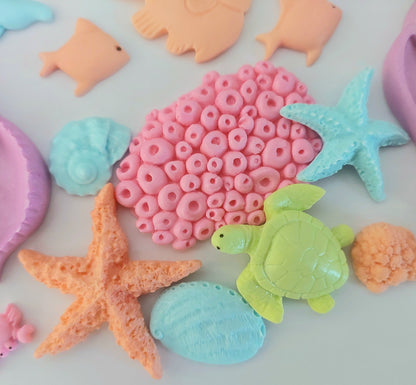 Close up of colourful sea life animals shells and corals, edible fondant icing decorations by Cake Candy NZ