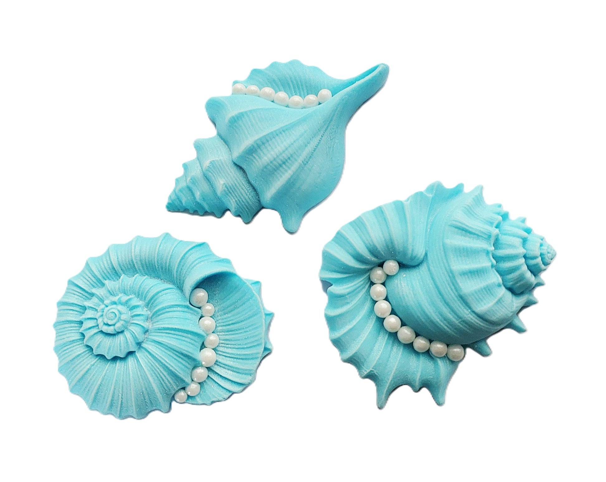 Three large blue decorative shells with pearl accents, edible fondant icing decorations by Cake Candy NZ