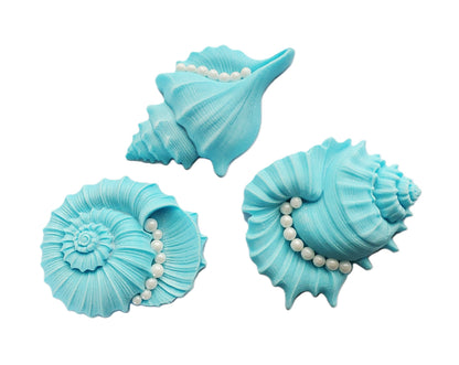 Three large blue decorative shells with pearl accents, edible fondant icing decorations by Cake Candy NZ