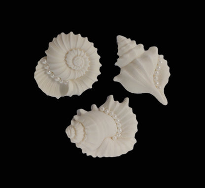 Three large white decorative shells with pearl accents, edible fondant icing decorations by Cake Candy NZ