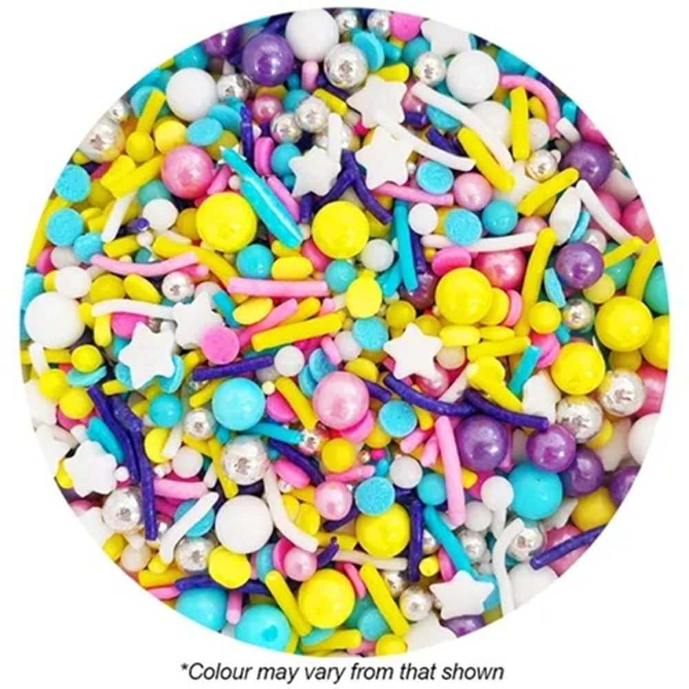 Assorted colorful sprinkles on a white background