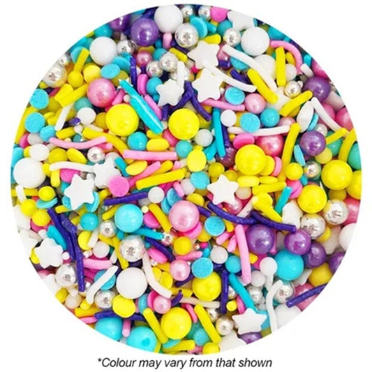 Assorted colorful sprinkles on a white background