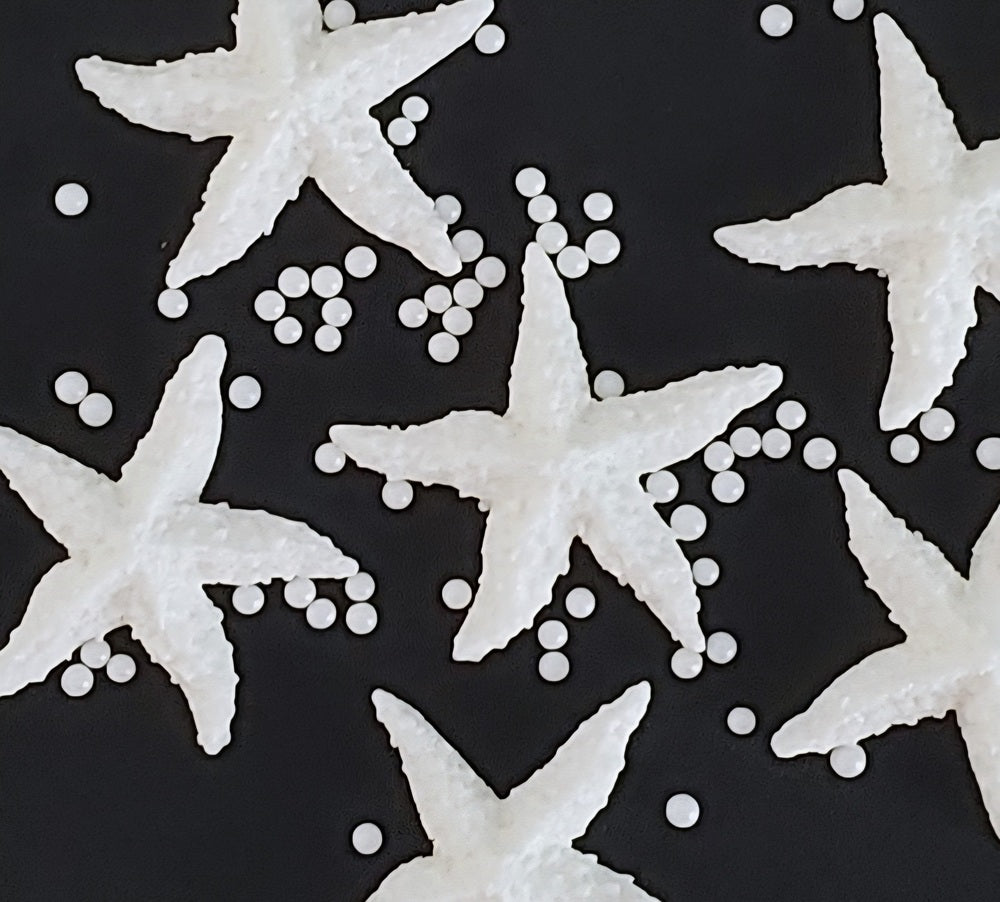 six white starfish, edible fondant icing decorations with sugar pearls by Cake Candy NZ