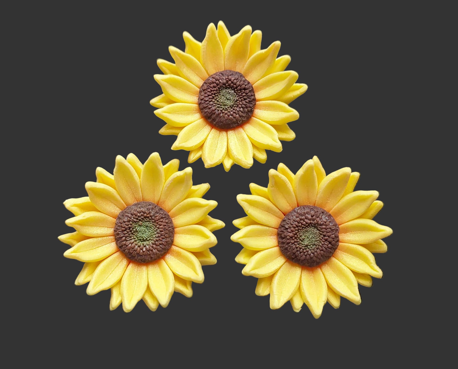 three yellow sunflowers, edible fondant icing decorations by Cake Candy NZ